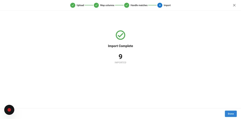 A wizard interface shows the steps of an import process: Upload, Map columns, Handle matches, and Import. The first three steps have green checkmarks, indicating completion. The fourth step, Import, is highlighted with a blue circle containing the number 4. Below, a large green checkmark is displayed, with the text "Import Complete" and the number "9 Imported" below it. A blue "Done" button is in the bottom right corner.
